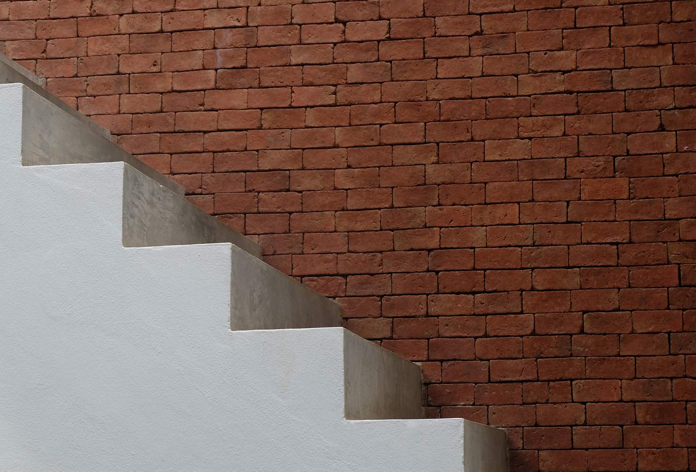 Stairs and brick wall